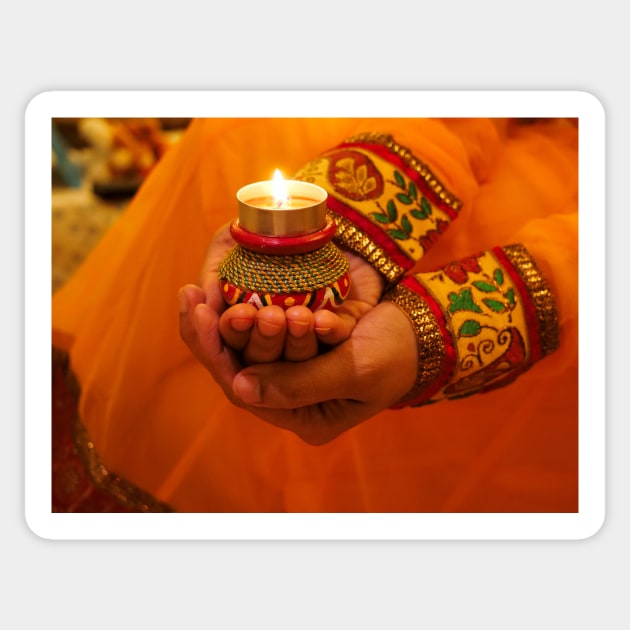 Decorative oil lamp in hand Diwali festival Sticker by fantastic-designs